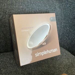 Rose gold sensor mirror compact